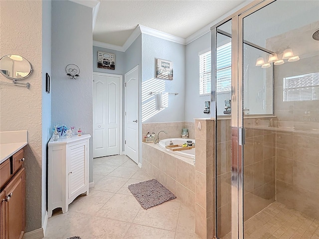 bathroom with plus walk in shower, tile patterned flooring, vanity, crown molding, and a textured ceiling