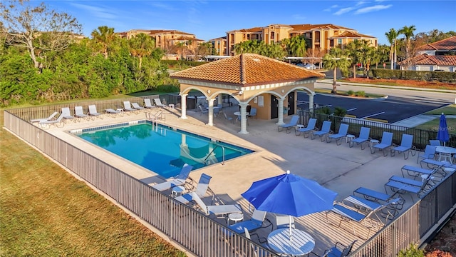 view of swimming pool featuring a patio