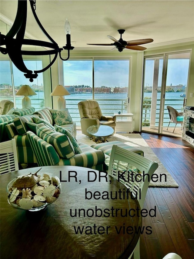 unfurnished sunroom with a water view and plenty of natural light