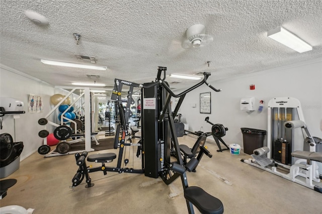 workout area featuring a textured ceiling