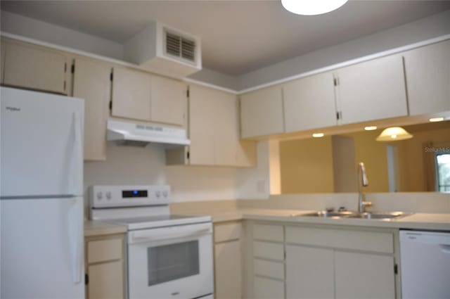 kitchen featuring sink and white appliances