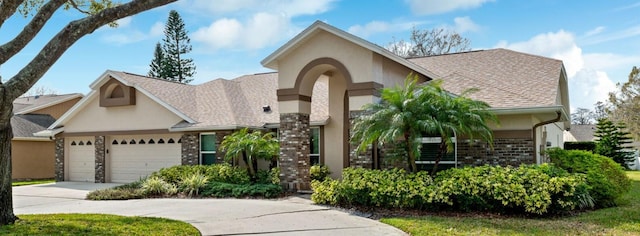 view of front of property with a garage