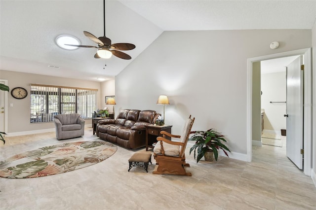 living room with ceiling fan, high vaulted ceiling, and a textured ceiling