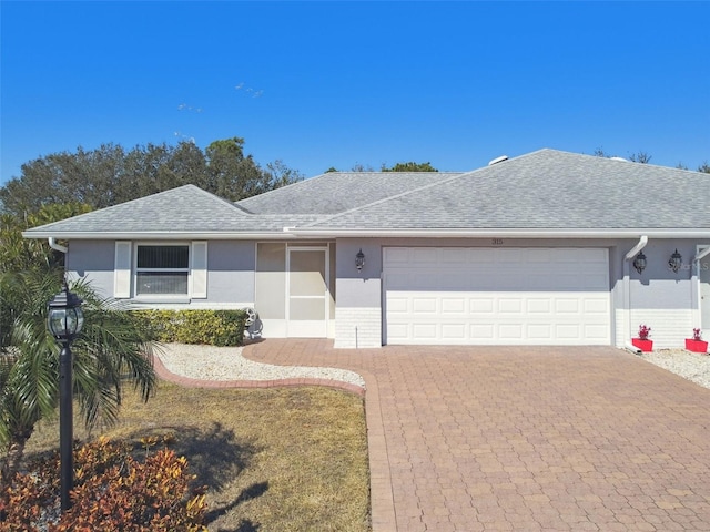 single story home with a garage