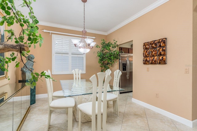 tiled dining room with crown molding and a chandelier