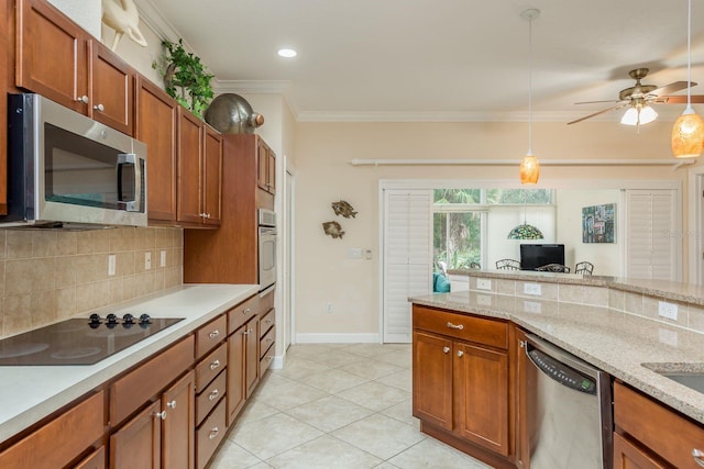 kitchen featuring light tile patterned floors, crown molding, stainless steel appliances, tasteful backsplash, and light stone countertops