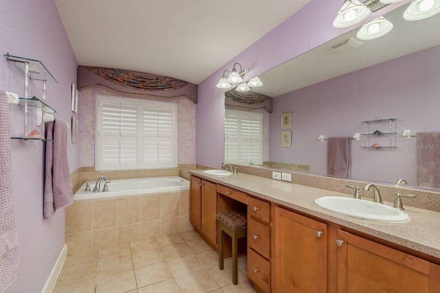 bathroom with vanity, tiled bath, and tile patterned floors