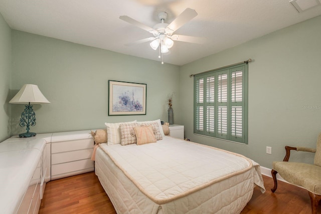 bedroom featuring ceiling fan and light wood-type flooring