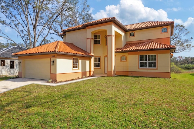 exterior space with a garage and a front lawn