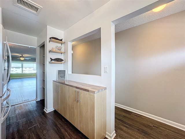 interior space featuring dark wood-type flooring