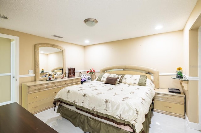 bedroom with a textured ceiling