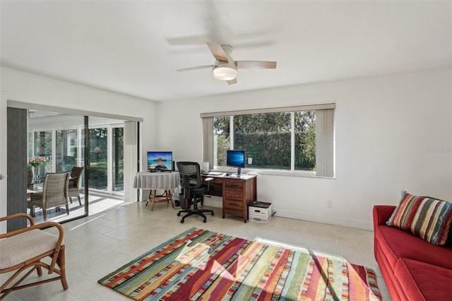 tiled home office with ceiling fan