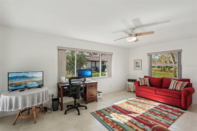 tiled home office with ceiling fan