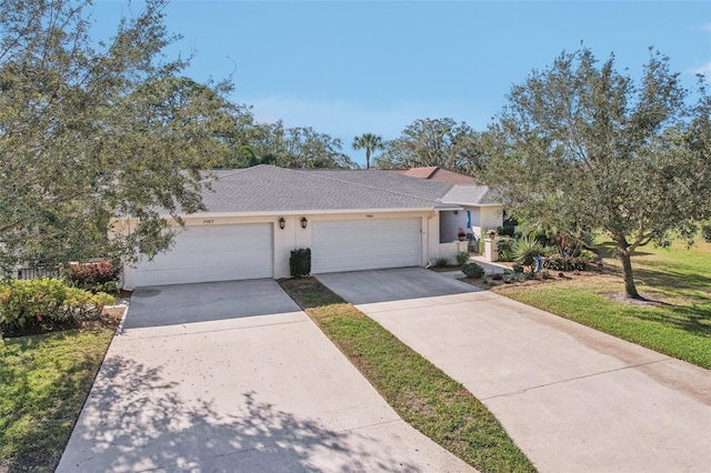 single story home with a garage