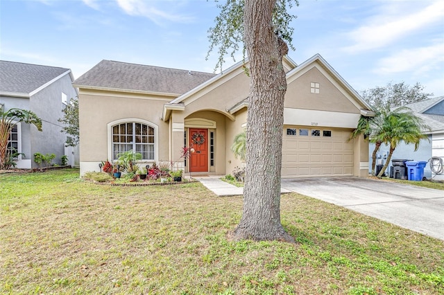 ranch-style house featuring a garage and a front yard