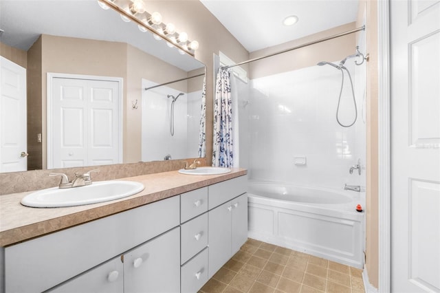 bathroom with shower / bath combo and vanity