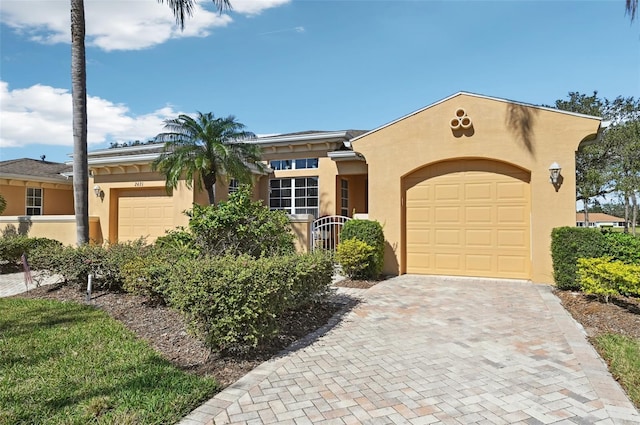 view of front of property with a garage