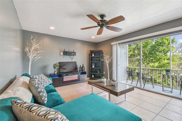 living area featuring tile patterned flooring, recessed lighting, and a ceiling fan