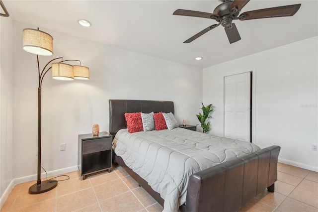 bedroom with light tile patterned flooring, recessed lighting, and baseboards