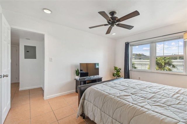 bedroom featuring baseboards, electric panel, recessed lighting, light tile patterned flooring, and a ceiling fan