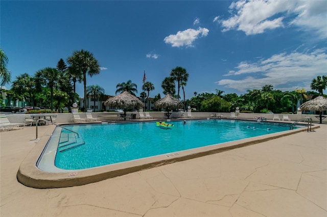 view of swimming pool featuring a patio area