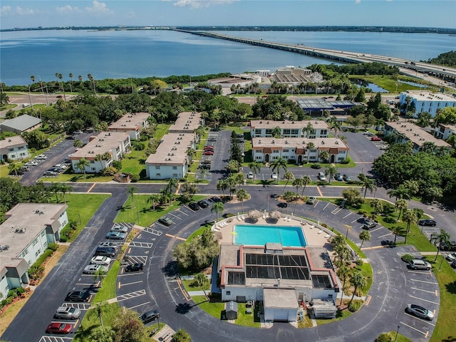 drone / aerial view with a water view