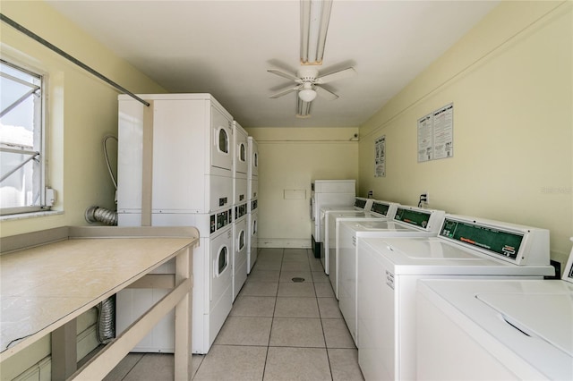 common laundry area featuring light tile patterned flooring, independent washer and dryer, ceiling fan, and stacked washer and dryer