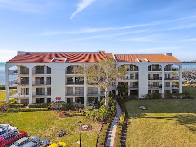 view of building exterior with a water view