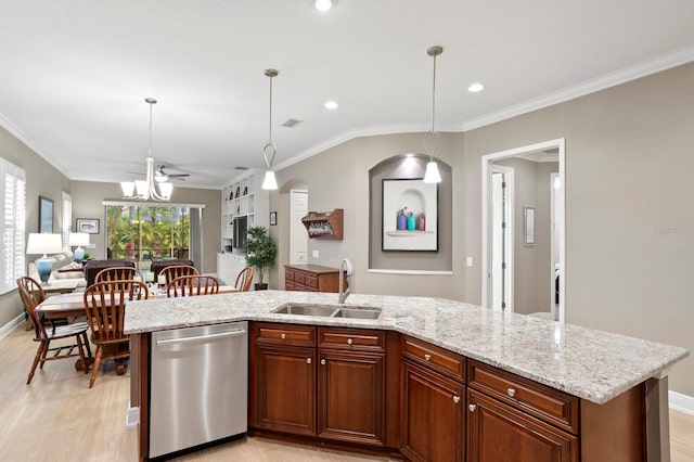 kitchen featuring pendant lighting, sink, ornamental molding, an island with sink, and stainless steel dishwasher