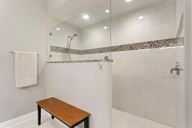 bathroom featuring tiled shower