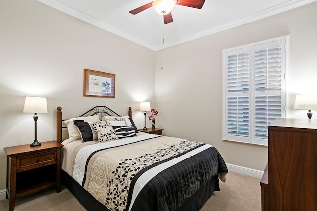 bedroom with ornamental molding, light carpet, and ceiling fan