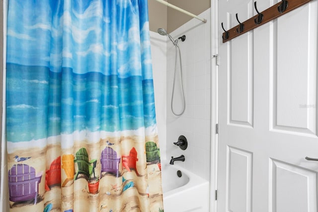 bathroom featuring shower / bath combo with shower curtain