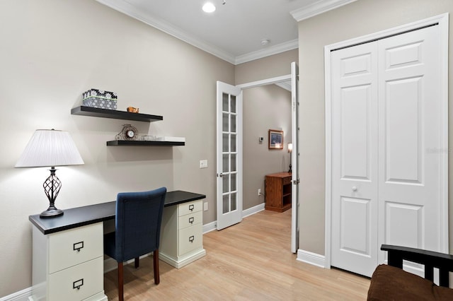 office with french doors, ornamental molding, and light hardwood / wood-style floors