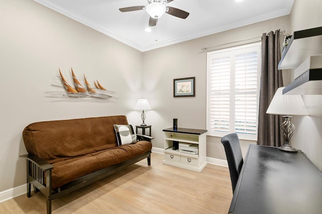 office with ceiling fan, ornamental molding, and light wood-type flooring