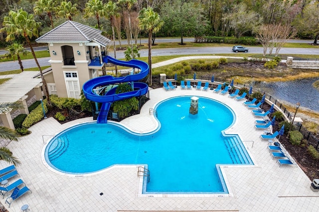 view of swimming pool featuring a water slide