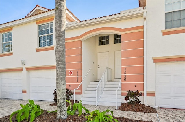 property entrance featuring a garage