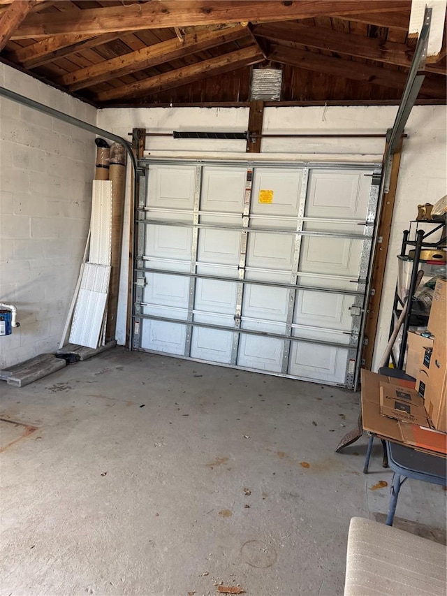 garage featuring concrete block wall