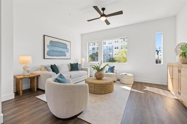 881 6th Ave S, Saint Petersburg, FL 33701 - living area featuring ceiling fan, baseboards, and dark wood-style flooring