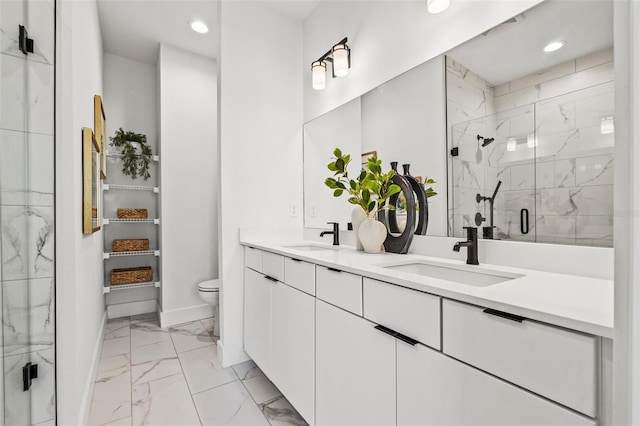 881 6th Ave S, Saint Petersburg, FL 33701 - bathroom with marble finish floor, double vanity, a sink, and a marble finish shower