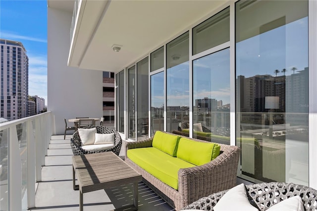 balcony featuring an outdoor living space