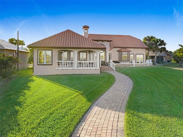 2186 Rockledge Dr, Rockledge, FL 32955 - back of house with a yard