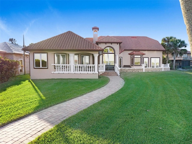 2186 Rockledge Dr, Rockledge, FL 32955 - rear view of property featuring a yard