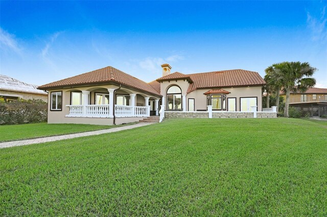 2186 Rockledge Dr, Rockledge, FL 32955 - view of front of house featuring a front lawn