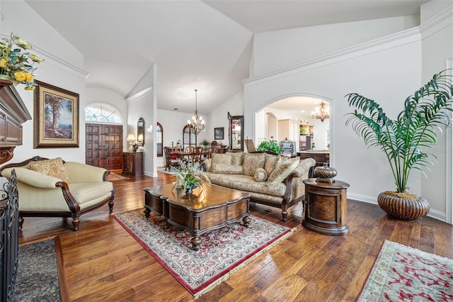 2186 Rockledge Dr, Rockledge, FL 32955 - living room with a healthy amount of sunlight, high vaulted ceiling, wood-type flooring, and a notable chandelier