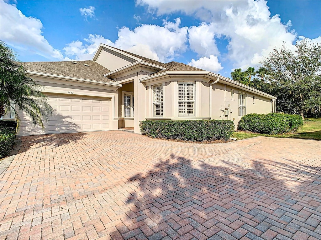 view of front of property with a garage