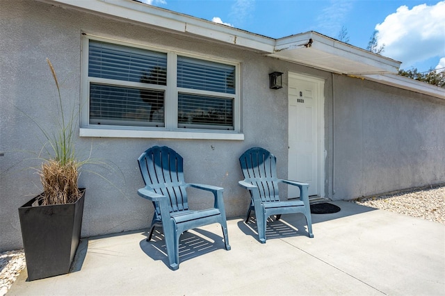 8820 Rocky Creek Dr, Tampa, FL 33615 - doorway to property featuring a patio area