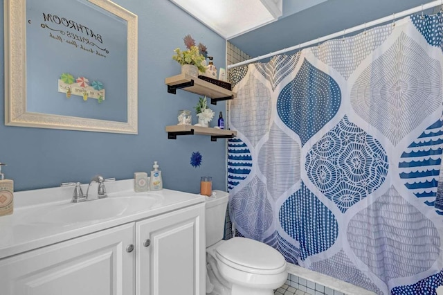 bathroom with toilet, tile patterned floors, a shower with shower curtain, and vanity