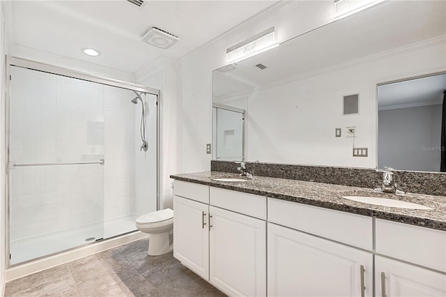 bathroom with ornamental molding, toilet, vanity, and walk in shower