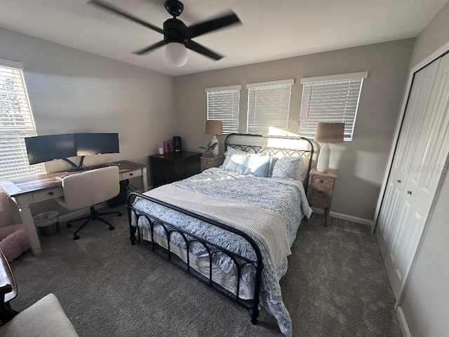 bedroom featuring dark carpet, a closet, and ceiling fan