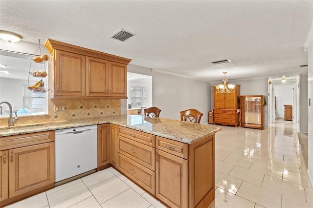 kitchen featuring sink, light tile patterned floors, white dishwasher, tasteful backsplash, and kitchen peninsula